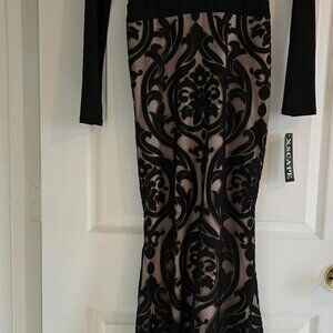 Xscape  size 4 gown. mesh sides with long skirt